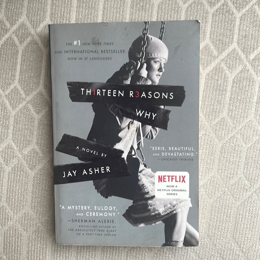 Thirteen reasons why book by Jay Asher 📖